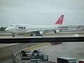 A Northwest Airlines Boeing 747-400 arrives, for our flight to Tokyo Narita International Airport to change flights to Hong Kong