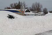 A car buried in the snow