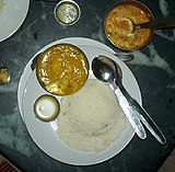 Idli served with pure ghee and sambar