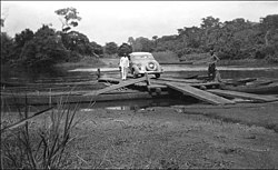 Crossing the Lindi River at Bafwasende, sometime between 1938 and 1958.