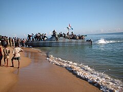 LTTE sea tigers loading a ship at Mullaitivu, 2002