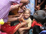 I-11. The Chudakarana ceremony of a Hindu boy in which he receives his first hair cut.