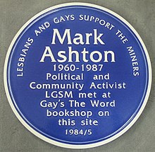 Blue plaque which reads 'Mark Ashton 1960-1987 Political and Community Activist LGSM met at Gay's The Word bookshop on this site 1984/5'
