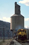 GE B40-8 #4002 passes under the Erie RR coaling tower at Susquehanna, Pennsylvania April 1989