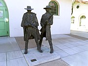 This is the location of the 1880s Tucson Depot. It was in this location where Frank Stilwell, suspected in the murder of Morgan Earp on March 18, 1882, was killed by Wyatt Earp in the company of Doc Holliday. The location is now part of the Amtrak Station which is located at 400 N. Toole Ave. and which was listed in the National Register of Historic Places on October 15, 1999, under the name of "Tucson Warehouse Historic District", ref.: #97000886.