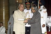 Brijmohan Lall Munjal (left) receiving the Padma Bhushan award