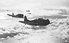 Douglas SBDs of USS Yorktown's air group head back to the ship after a strike on Japanese ships in Tulagi harbor