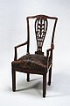 Colonial Revival armchair (1886–88), by Francis H. Bacon for A. H. Davenport and Company, Metropolitan Museum of Art.
