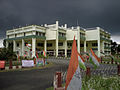 The Administrative Building under clouds.