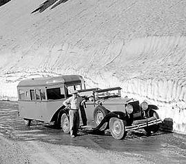 Car and tourist observation trailer, Glacier National Park, Montana, 1933