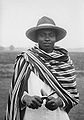 A Sakalava musician in Madagascar wearing a traditional lamba