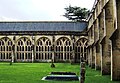 The cloisters, built in several stages, have Perpendicular tracery.