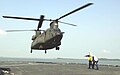 127 Squadron CH-47SD lands aboard 「拉什摩爾」號船塢登陸艦 during Exercise CARAT 2001.