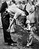 (1957) a policeman patiently reasons with a two-year-old boy