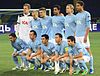 Malmö FF line up prior to a match against FC Metalist Kharkiv