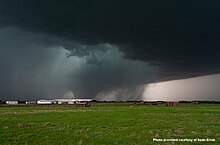 Large, menacing daytime tornado