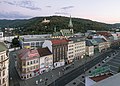 Ústí nad Labem, street view Mírové Náměstí to the west from Interhotel Bohemia with church (kostel Nanebevzetí Panny Marie) in the background