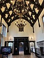 Looking to the south end of the hall and through to the small inner room beyond.