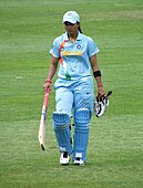 N-35 An Indian batswoman (does anyone know her name?) returns to the stands at the ICC Women's Cricket World Cup, Sydney, Australia, 2009.