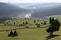 Overview of Slătioara (with its UNESCO-recognized secular forest around), a picturesque Romanian Waldhufendorf