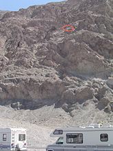 Sea Level sign seen on cliff (circled in red) at Badwater Basin, Death Valley National Park.