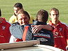 Chris Brass hugs Viv Busby after a win for York City in 2004