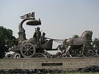 Krishna Arjun Rath Monument at Brahma Sarovar. Bronze statue, by Ram V. and Anil R. Sutar, 2008.