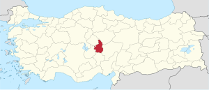 Nevsehir highlighted in red on a beige political map of Turkeym