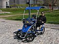 A tourist rental quadracycle, a Quadricycle International Quad-3