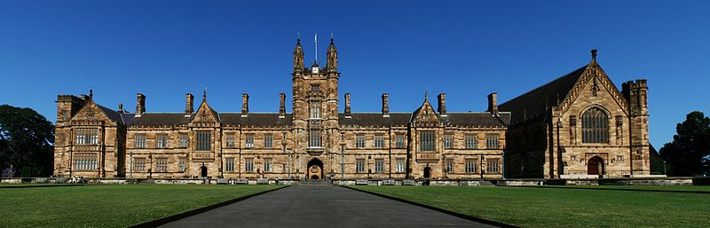 Photo of the facade of Sydney University on a bright morning. The building is described in the text.