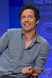 A photograph of Tom Cavanagh at a PaleyFest presentation in 2015.