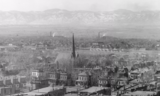 Skyline view of Grace Church (center) with Evans Chapel partially obscured, c. 1910