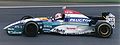 Rubens Barrichello driving the Jordan 195 at the 1995 British Grand Prix with aqua green livery.