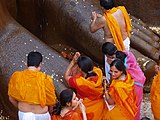 I-1 A Jain family praying at Shravanabelagola, Karnataka.