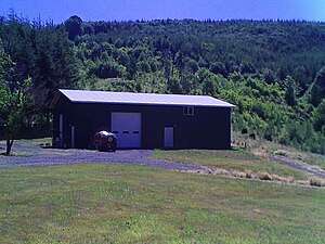 Tualatin Mountains behind a barn at Ingenuity Farm in Yankton