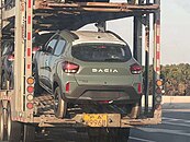 European market Dacia Spring Electric being transported to the docks in Shanghai, China.