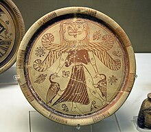 An ancient Greek plate, showing a gorgon