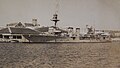 HMS Caradoc (D60) berthed on Front Street, circa 1928.