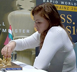 Judit Polgar playing a chess move