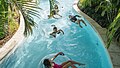 Children in the lazy river at Harborside Pool Club at The Boca Raton