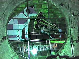 One of 4 Nipper stained glass windows seen from inside the "Nipper Tower" in the old RCA Victor Building 17[74]