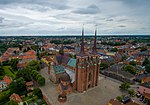 Roskilde Cathedral, a brick building with two spires. Look from above.
