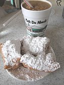 American-style beignets with powdered sugar