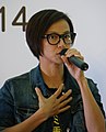 何韵诗（1977–）现身支持2014年雨伞运动的香港歌手