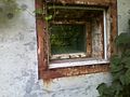 blast window in reinforced concrete bunker used to observe early rocket and explosive tests at site.