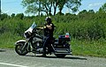 An Ontario Provincial Police officer on a Harley-Davidson FLHP