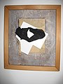 "Preferred Muse" created with shell, lace stocking, cardboard, strand board, white wash, and stain, 1999, by Doren Robbins