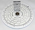 A simple circular slide rule, made by Concise Co., Ltd., Tokyo, Japan, with only inverse, square, and cubic scales. On the reverse is a handy list of 38 metric/imperial conversion factors.
