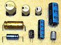 Axial, radial (single ended) anv V-chip styles of aluminum electrolytic capacitors