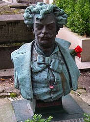 grave stone bust of Andre Gill